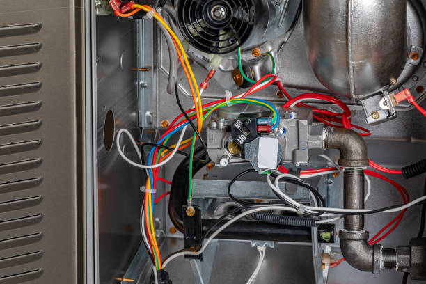 Elevate Heating technician restoring furnace performance safely